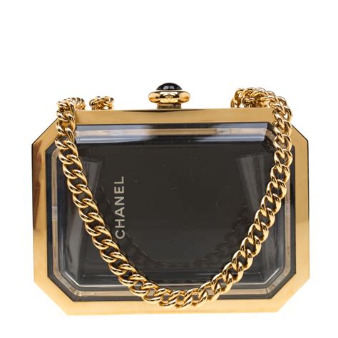 chanel black gold clutch|Chanel clutch with hand strap.